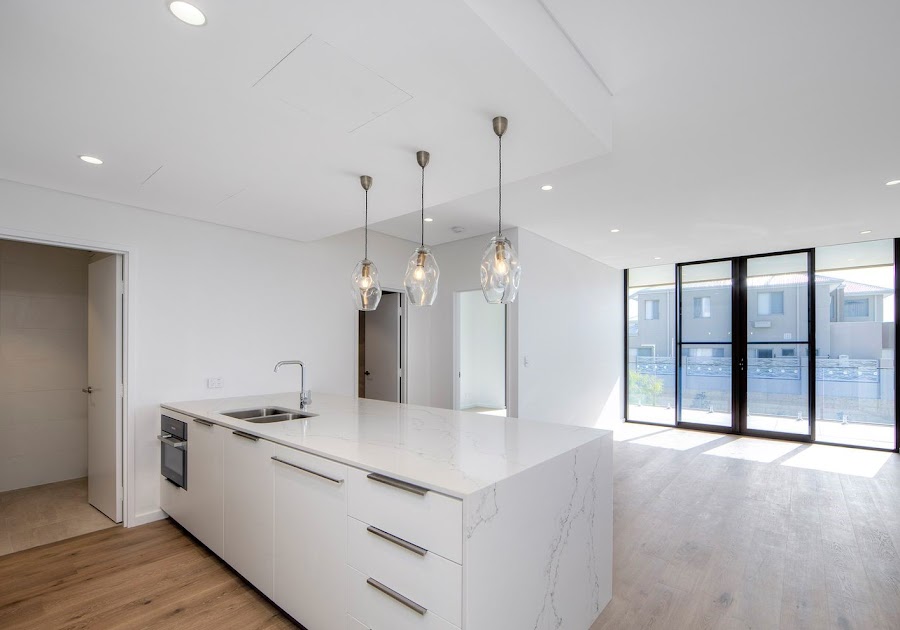 Freshly painted modern kitchen with white cabinetry
